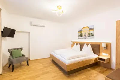 Ein Bett oder Betten in einem Zimmer der Unterkunft Altes Backhaus