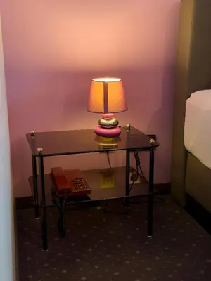 Ein Bett oder Betten in einem Zimmer der Unterkunft Pension Erlaa