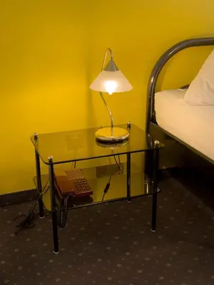 Ein Bett oder Betten in einem Zimmer der Unterkunft Pension Erlaa