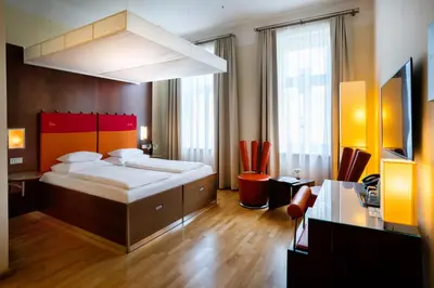Ein Bett oder Betten in einem Zimmer der Unterkunft Hotel Rathaus - Wein & Design