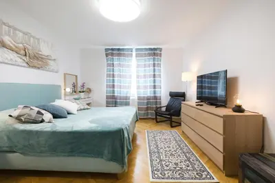 Ein Bett oder Betten in einem Zimmer der Unterkunft Apartment Rudolfsplatz