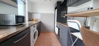 Küche/Küchenzeile in der Unterkunft govienna - Messe Wien Apartment