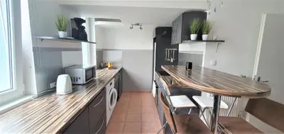Küche/Küchenzeile in der Unterkunft govienna - Messe Wien Apartment