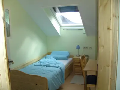 Ein Bett oder Betten in einem Zimmer der Unterkunft Haus Bergblick