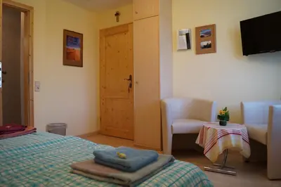 Ein Bett oder Betten in einem Zimmer der Unterkunft Haus Bergblick