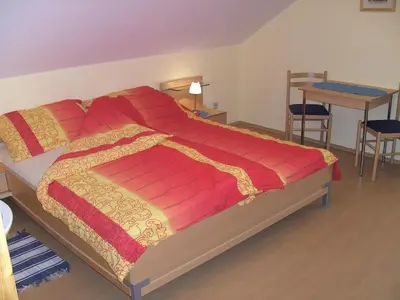 Ein Bett oder Betten in einem Zimmer der Unterkunft Haus Bergblick
