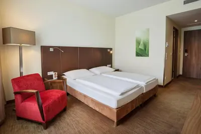 Ein Bett oder Betten in einem Zimmer der Unterkunft Austria Trend Hotel Doppio Wien