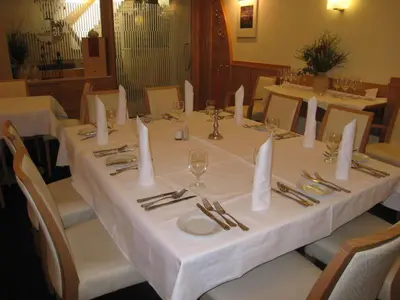 Ein Restaurant oder anderes Speiselokal in der Unterkunft Landgasthof Hotel Muhr