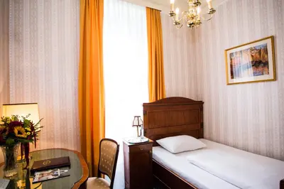 Ein Bett oder Betten in einem Zimmer der Unterkunft Hotel Atlanta