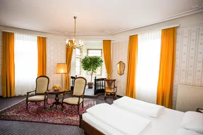 Ein Bett oder Betten in einem Zimmer der Unterkunft Hotel Atlanta