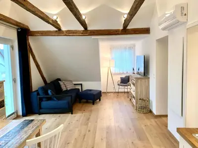 Ein Sitzbereich in der Unterkunft Logis 11 Apartments