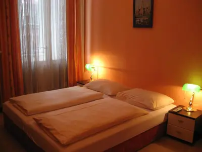Ein Bett oder Betten in einem Zimmer der Unterkunft Pension Schottentor
