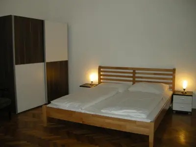 Ein Bett oder Betten in einem Zimmer der Unterkunft Pension Schottentor
