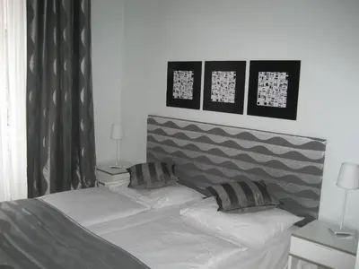 Ein Bett oder Betten in einem Zimmer der Unterkunft Pension Schottentor