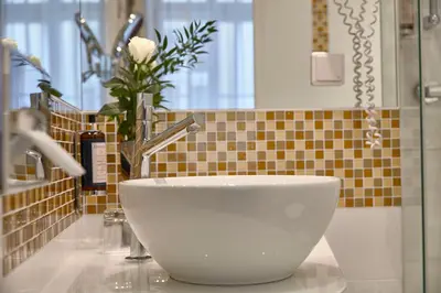 Ein Badezimmer in der Unterkunft Hotel Wandl