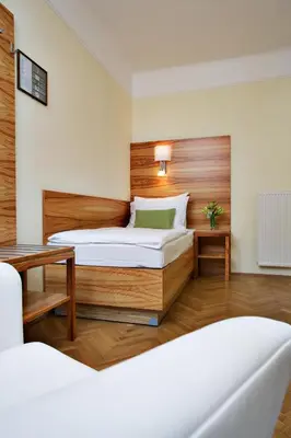 Ein Bett oder Betten in einem Zimmer der Unterkunft Hotel Wandl