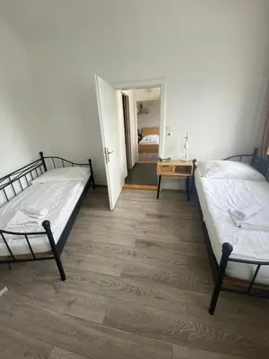 Ein Bett oder Betten in einem Zimmer der Unterkunft Pension Lizzi