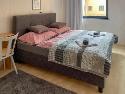 Ein Bett oder Betten in einem Zimmer der Unterkunft Máté Pension