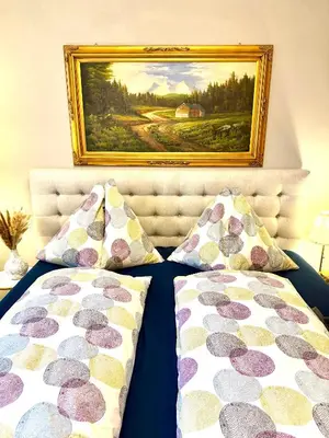 Ein Bett oder Betten in einem Zimmer der Unterkunft Center Apartment with 360° Rooftop