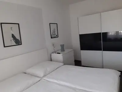 Ein Bett oder Betten in einem Zimmer der Unterkunft Ferienwohnung Leithaberg
