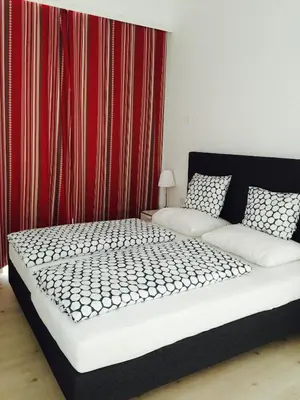 Ein Bett oder Betten in einem Zimmer der Unterkunft Pension am Wienfluss