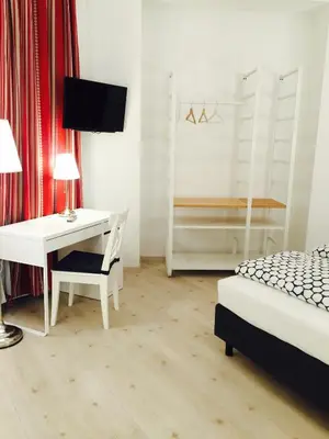 Ein Bett oder Betten in einem Zimmer der Unterkunft Pension am Wienfluss