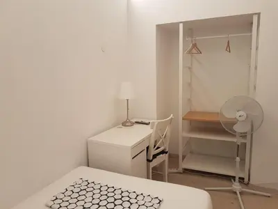 Ein Bett oder Betten in einem Zimmer der Unterkunft Pension am Wienfluss