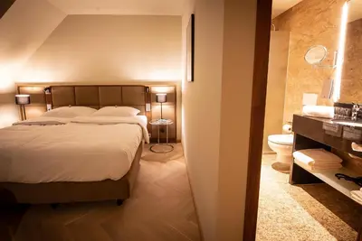 Ein Bett oder Betten in einem Zimmer der Unterkunft EST Residence Schönbrunn Vienna - Apartments