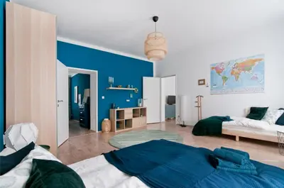 Ein Bett oder Betten in einem Zimmer der Unterkunft Stylish Self-Check-In Apartment With 2 Bedrooms