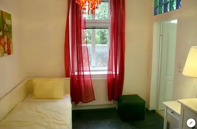 Ein Bett oder Betten in einem Zimmer der Unterkunft Suite Apartment Jedlesee