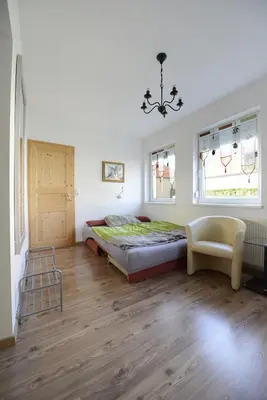 Ein Bett oder Betten in einem Zimmer der Unterkunft Ferienwohnungen Karoly