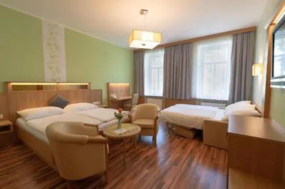 Ein Bett oder Betten in einem Zimmer der Unterkunft Pension Wienerstub'n