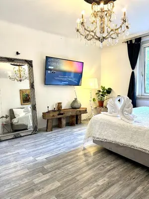 Ein Bett oder Betten in einem Zimmer der Unterkunft Central &cozy