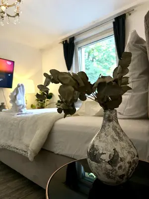 Ein Bett oder Betten in einem Zimmer der Unterkunft Central &cozy