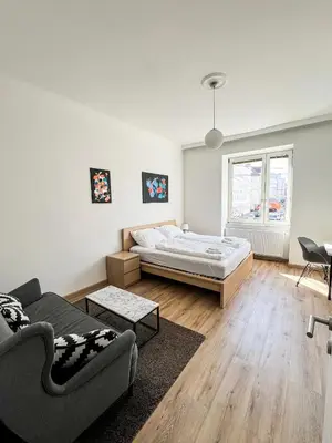 Ein Bett oder Betten in einem Zimmer der Unterkunft Vienna Experience