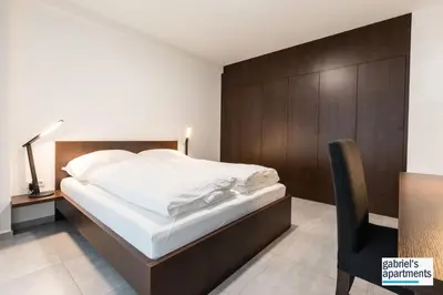 Ein Bett oder Betten in einem Zimmer der Unterkunft Gabriel´s Apartments