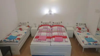 Ein Bett oder Betten in einem Zimmer der Unterkunft Apartments Heine