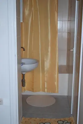 Ein Badezimmer in der Unterkunft Apartments Heine
