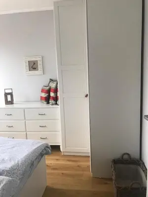 Ein Bett oder Betten in einem Zimmer der Unterkunft Modern apartment with balcony