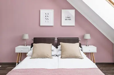 Ein Bett oder Betten in einem Zimmer der Unterkunft Vienna 15 Design Apartment