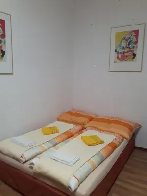 Ein Bett oder Betten in einem Zimmer der Unterkunft Ferienwohnung Schloessel 10