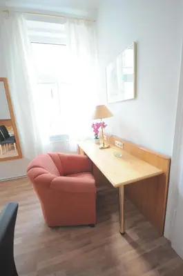 Ein Sitzbereich in der Unterkunft Ferienwohnung Schloessel 10