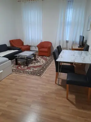 Ein Sitzbereich in der Unterkunft Ferienwohnung Schloessel 10