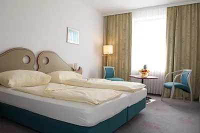 Ein Bett oder Betten in einem Zimmer der Unterkunft Seminarhotel Göttlesbrunn