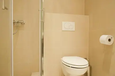 Ein Badezimmer in der Unterkunft Vienna Central Apartment Siebenbrunnen