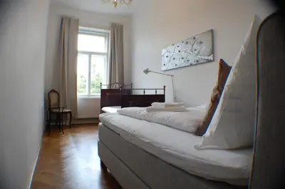 Ein Bett oder Betten in einem Zimmer der Unterkunft Kunsthaus Apartments