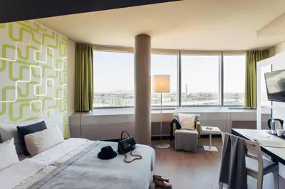 Ein Bett oder Betten in einem Zimmer der Unterkunft harry's home Wien hotel & apartments