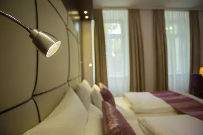 Ein Bett oder Betten in einem Zimmer der Unterkunft Best Western Plus Hotel Arcadia