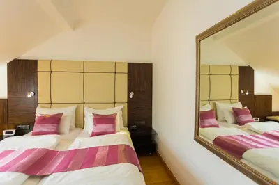 Ein Bett oder Betten in einem Zimmer der Unterkunft Best Western Plus Hotel Arcadia