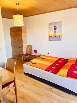 Ein Bett oder Betten in einem Zimmer der Unterkunft Frühstückspension See-Panorama